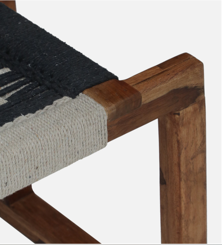 WOOD CURLS Eira 2 seater bench featuring a natural Sheesham wood frame and a hand-woven monochrome cotton rope seat.