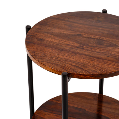 WOOD CURLS Serenity round coffee table featuring a natural Sheesham wood top and sturdy black metal legs