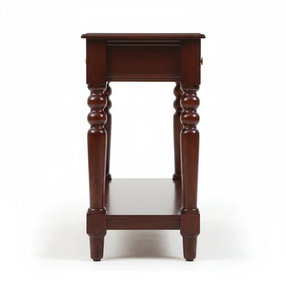 WOOD CURLS Aurea solid Sheesham wood console table in honey oak finish, side view showing turned legs and lower shelf.