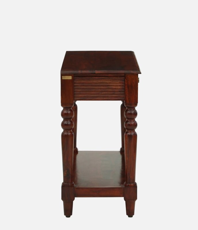 WOOD CURLS Aurea solid Sheesham wood console table in honey oak finish with turned legs and side view profile