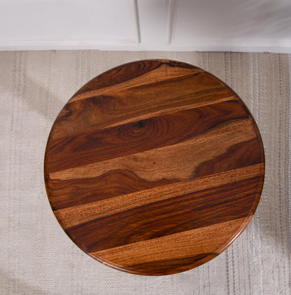WOOD CURLS round end table made of premium Sheesham wood with a natural grain finish, viewed from directly above.