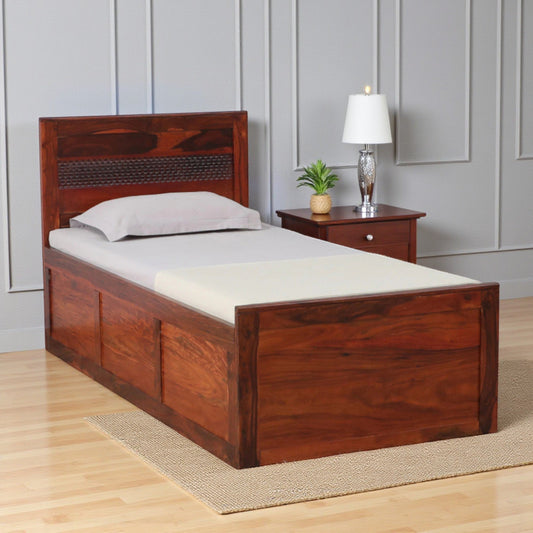 Sheesham wood single bed with box storage honey oak finish

Solid wood single bed with storage for bedroom

Honey oak finish wooden single bed frame

Storage compartment inside Sheesham wood bed