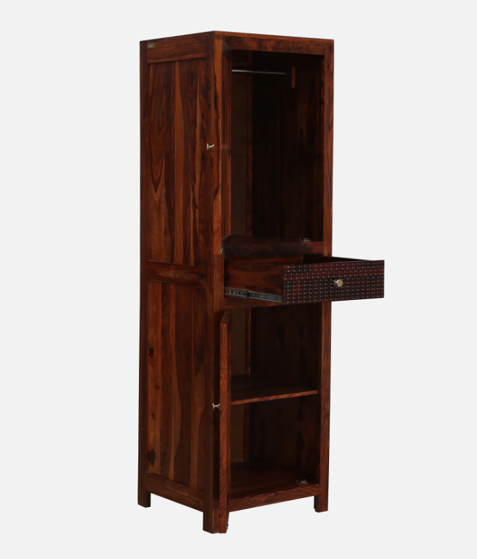 WOOD CURLS Elyssian one-door wardrobe in solid Sheesham wood with a honey oak finish, featuring an open drawer.
