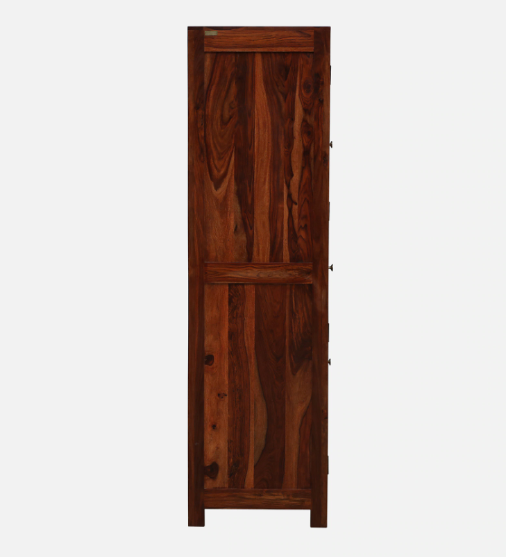 WOOD CURLS Elyssian one-door wardrobe in solid Sheesham wood with a rich honey oak finish and natural grain patterns.