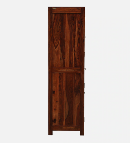 WOOD CURLS Elyssian one-door wardrobe in solid Sheesham wood with a rich honey oak finish and natural grain patterns.