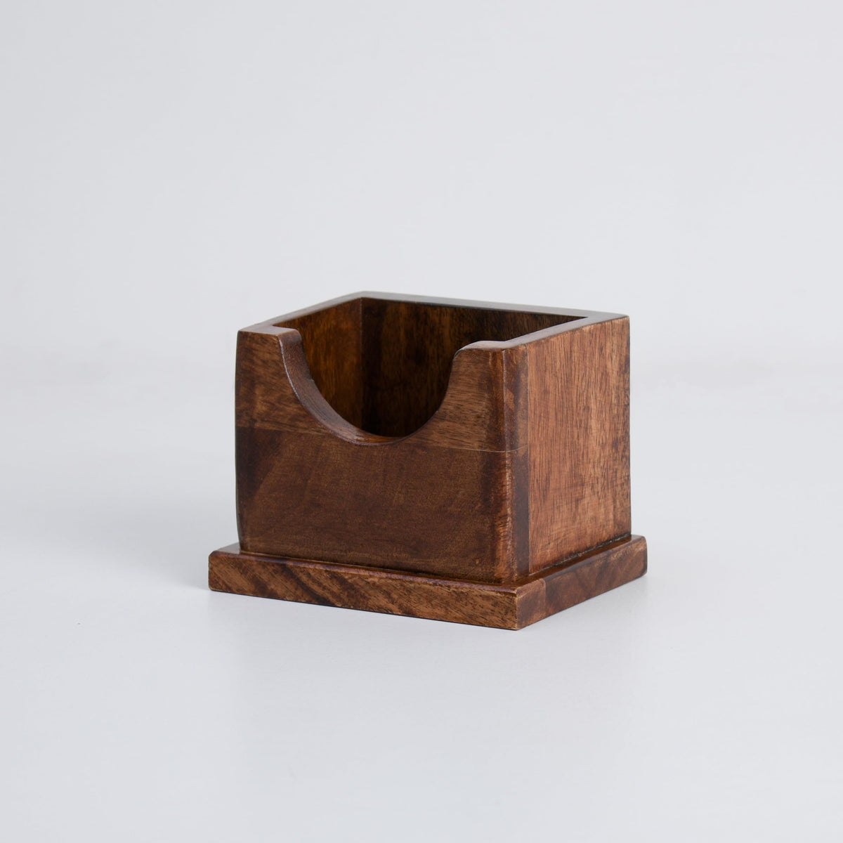 WOOD CURLS solid wood pencil holder with a minimalist design for desk organization and stationery storage.
