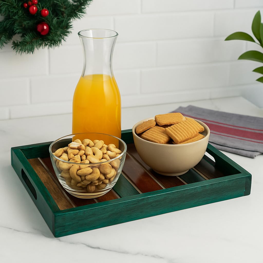 WOOD CURLS handcrafted teal mango wood serving tray with a slatted base, holding bowls of snacks and orange juice.