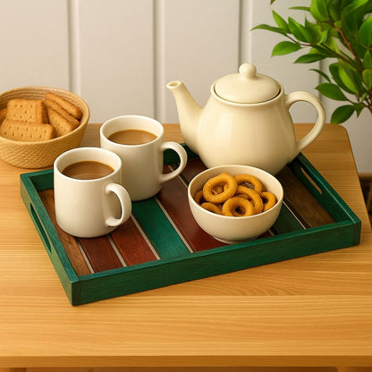 WOOD CURLS handcrafted rectangular mango wood serving tray in teal with a slatted design holding tea and snacks.