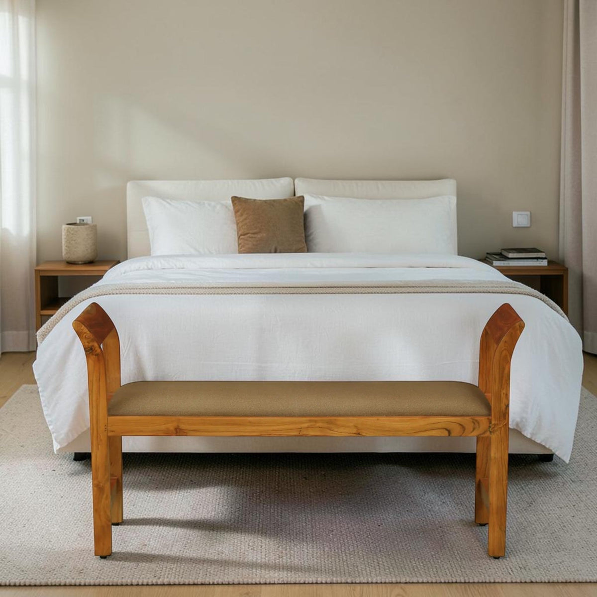 WOOD CURLS Thalia dining bench in acacia wood with a brown upholstered seat placed at the foot of a modern bed.