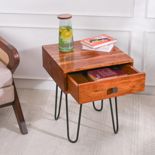 WOOD CURLS Torino rustic solid wood side table with an open drawer, featuring black iron hairpin legs.