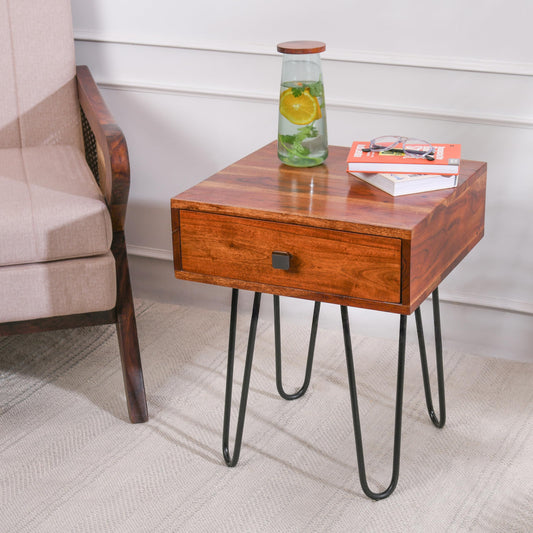 WOOD CURLS Torino rustic solid wood side table with a single drawer and black industrial metal hairpin legs.