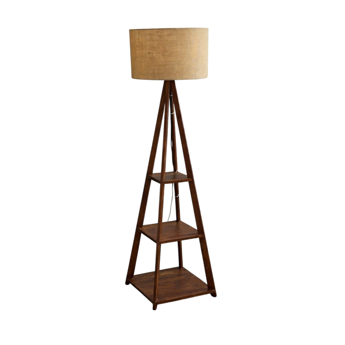 WOOD CURLS walnut mango wood tripod floor lamp with three storage shelves and a textured beige fabric drum shade.