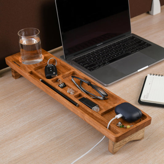 WOOD CURLS wooden desk organizer tray with compartments for stationery, phone, and a beverage on a workspace desk.
