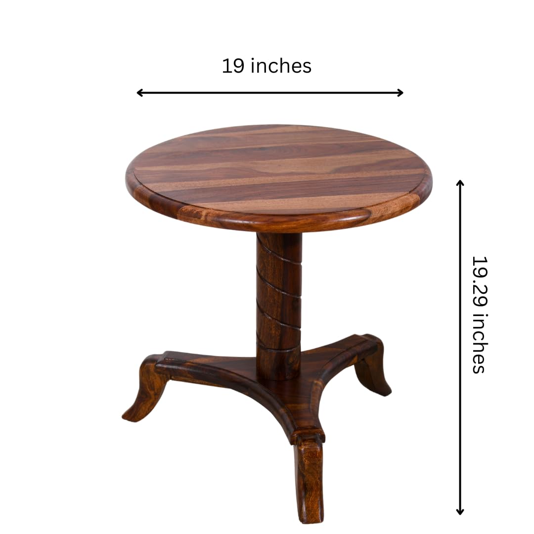 WOOD CURLS round end table made of premium Sheesham wood with a natural grain finish and a curved pedestal base.