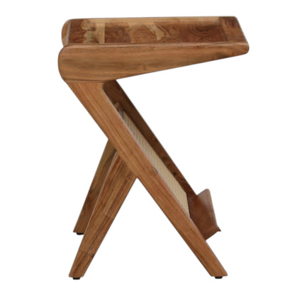 WOOD CURLS Z-shaped solid wood side table with a natural finish and integrated rattan storage rack